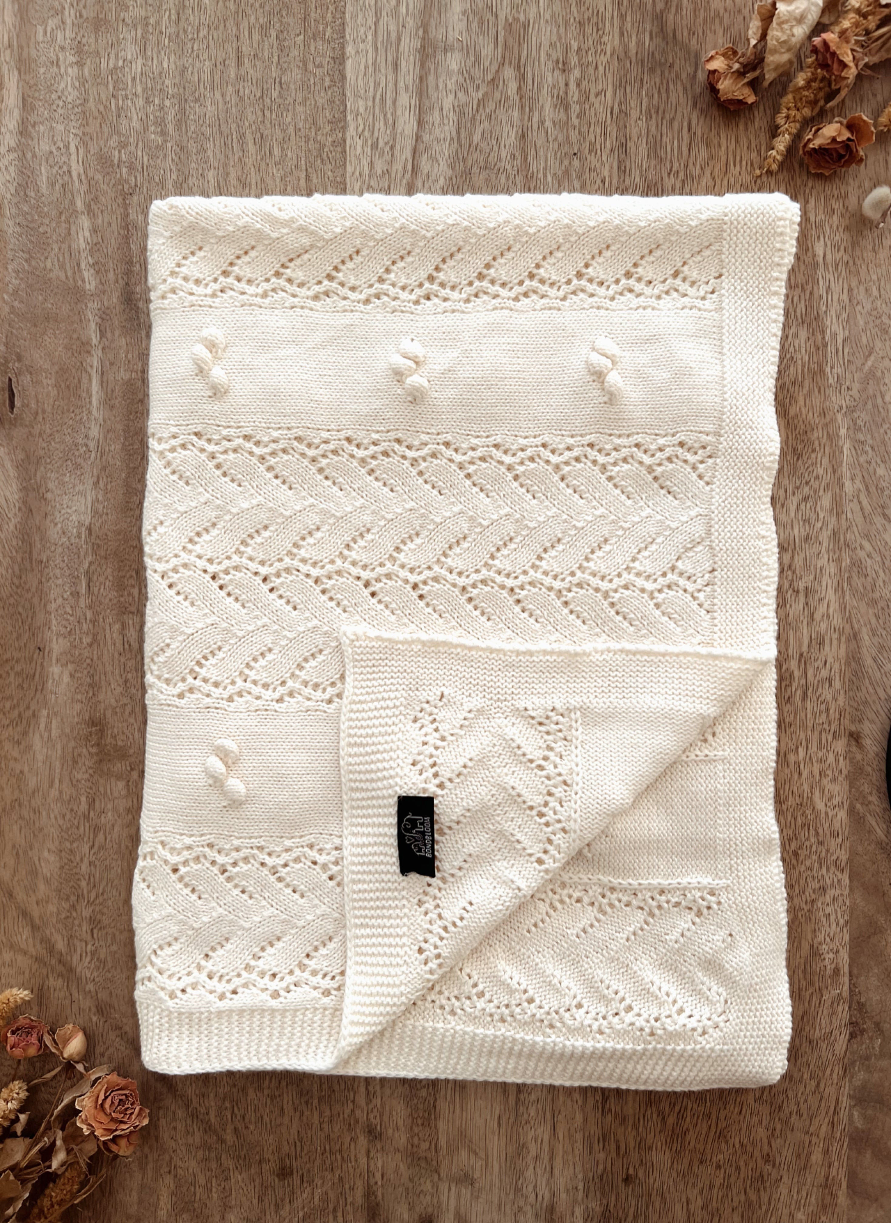 Knitted Pom-Pom Baby Blanket
